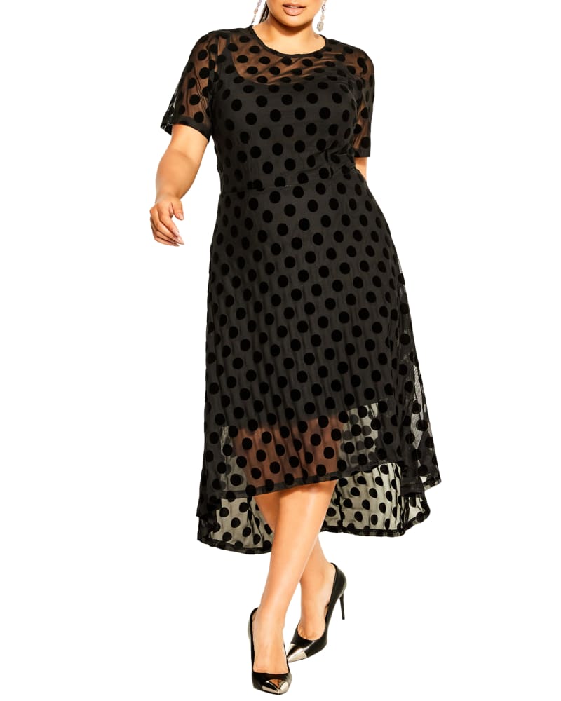 Front of a model wearing a size S DRESS SPOT FLOCK in Black by City Chic. | dia_product_style_image_id:317916